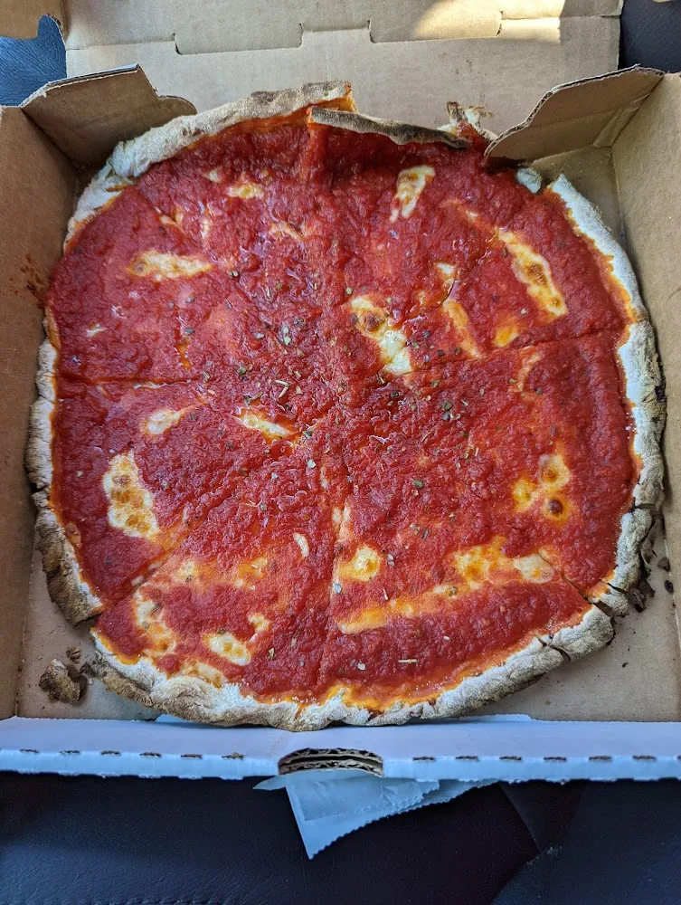 Specializing in Tomato Pies Pizza